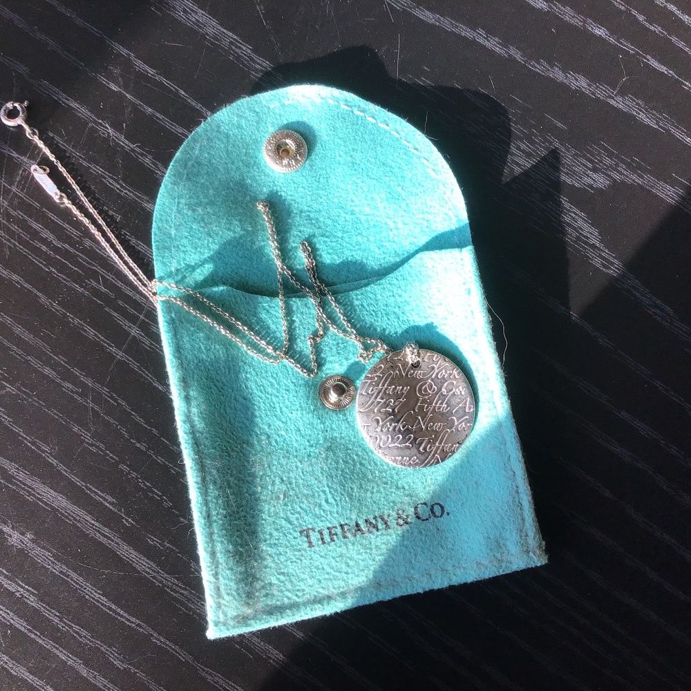 Tiffany and co NY address notes wavy disk necklace